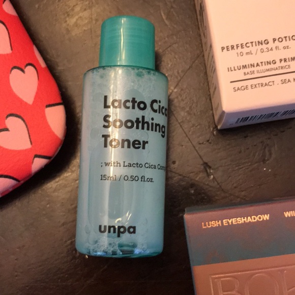 Ipsy make up bag with several trial size make up. - Picture 2 of 5